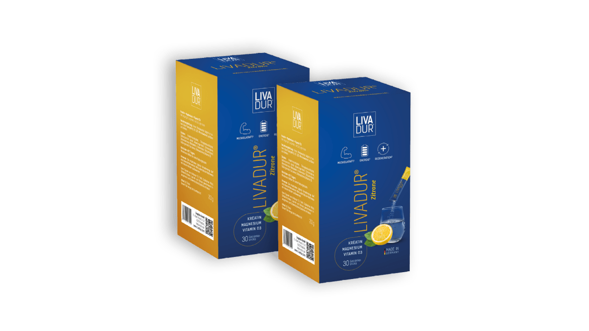 Two boxes of LIVADUR® - Zitronengeschmack, each with 30 Tagessticks, in blue and yellow packaging. A glass of lemon water with a dissolving tablet illustrates Kreatin benefits for Muskelaufbau and usage instructions.